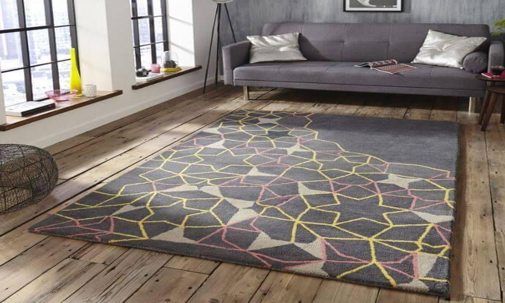 How can you tell if a rug is truly handmade and what should you look for when shopping for it?
